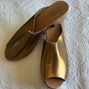Gold and wooden Slip on from Italy, designer Charlotte Stone